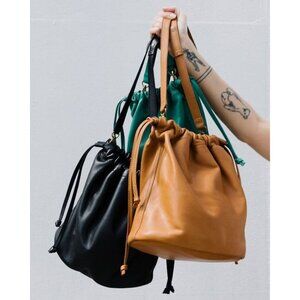 Madewell Leather Drawstring Crossbody Bag in Black, Tan, and Green